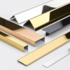 Stainless steel tile edge trim application for bathroom wall tiles